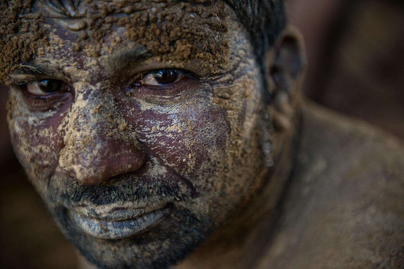Before and after each wrestling match, Kushti wrestlers rub a special mix of dirt and other ingredients into their skin.