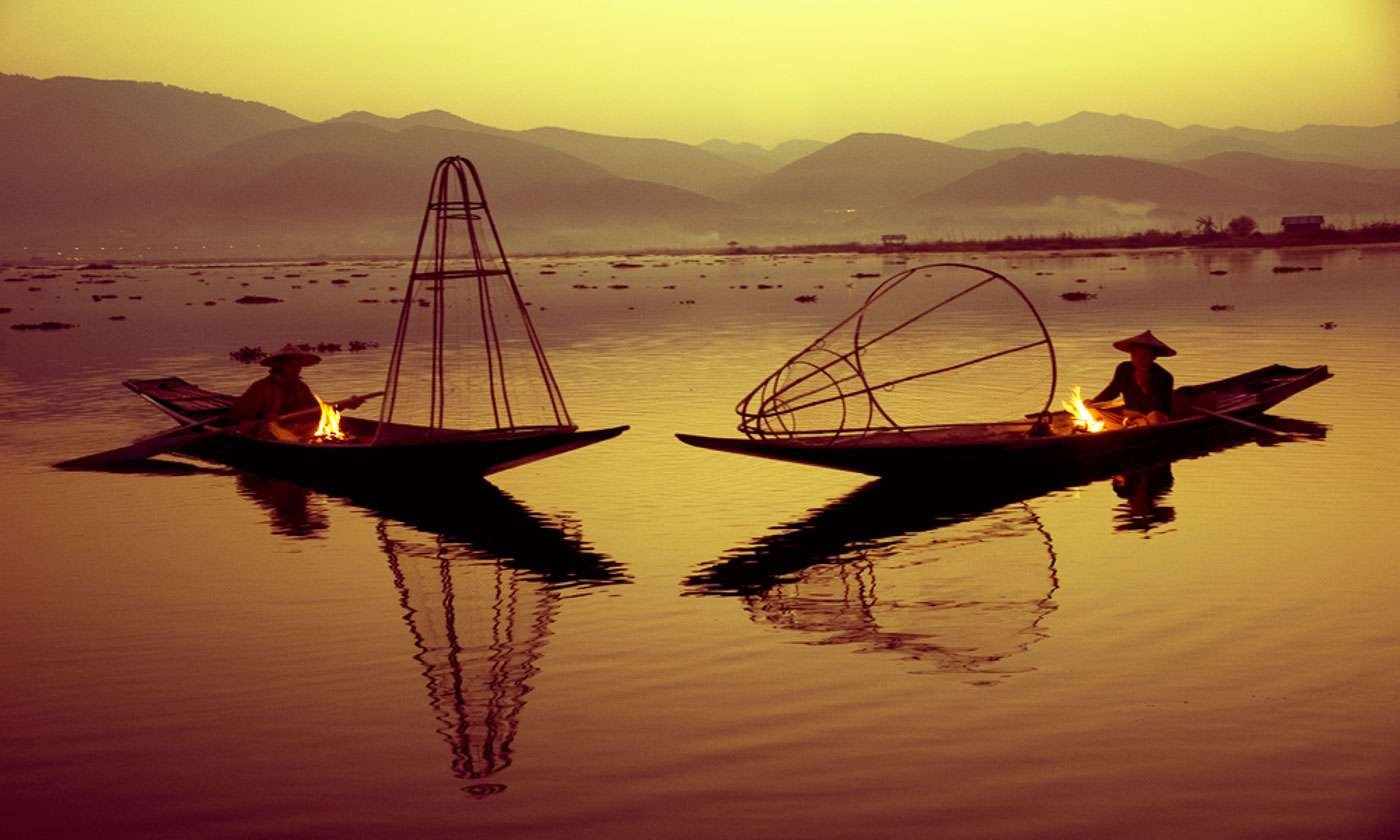 Sunrise fishing on Inle Lake, one of the iconic images from Myanmar.