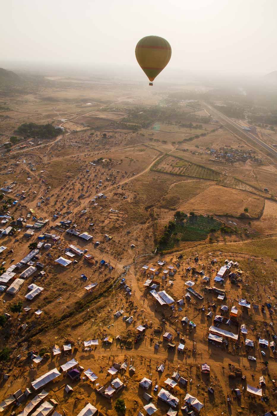 Floating silently over the Pushkar Camel Fair and its desert setting in a hot air balloon.